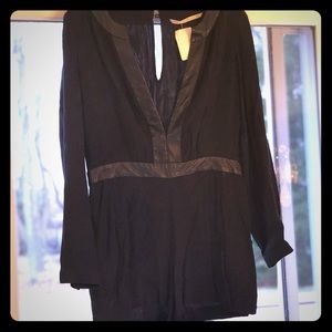 Black romper with leather detail